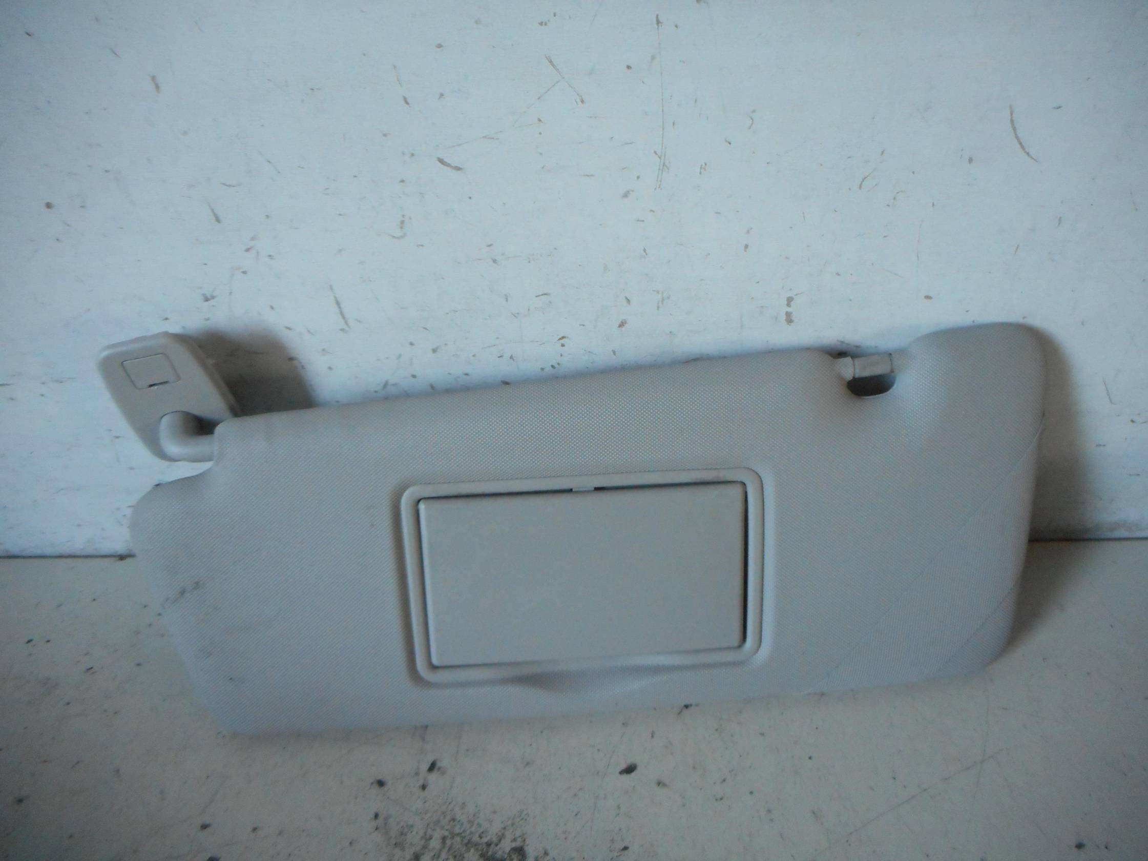 Aletta parasole parabrezza sx.